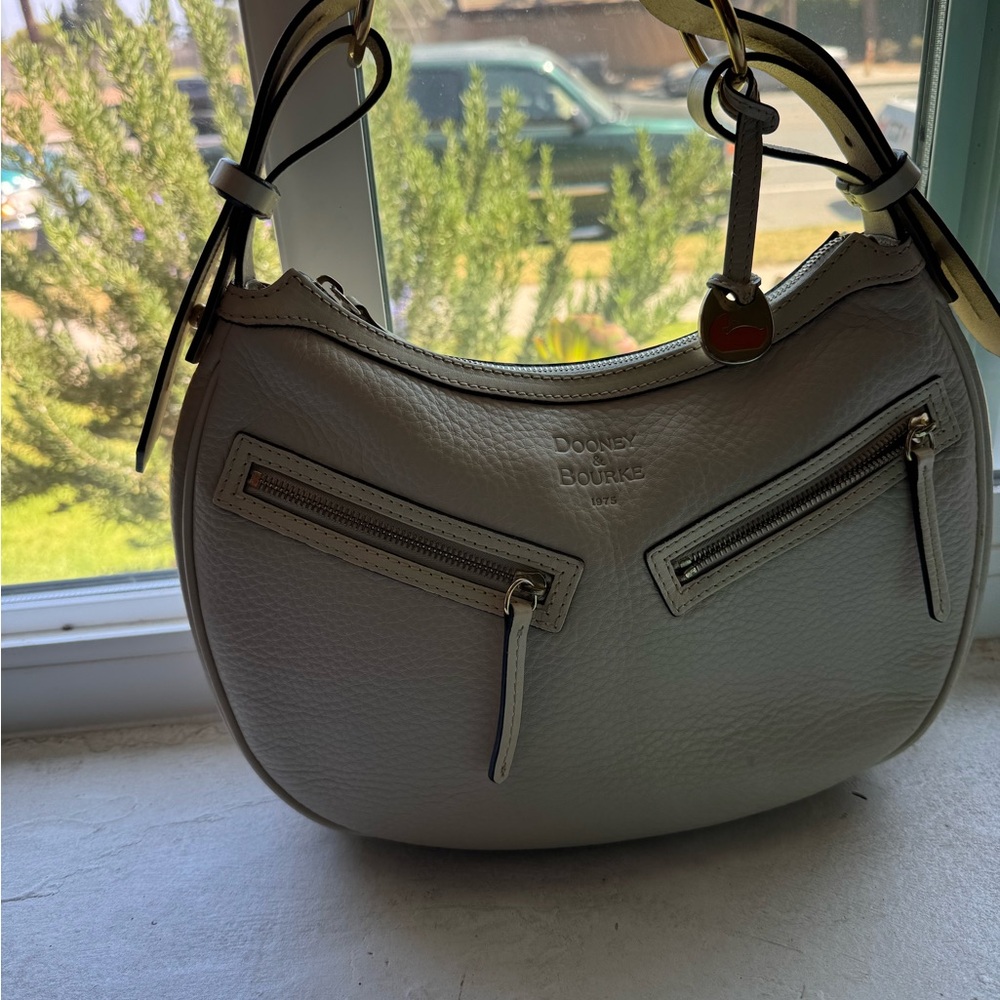 Dooney & Bourke Cream Shoulder Bag with Sleek Design